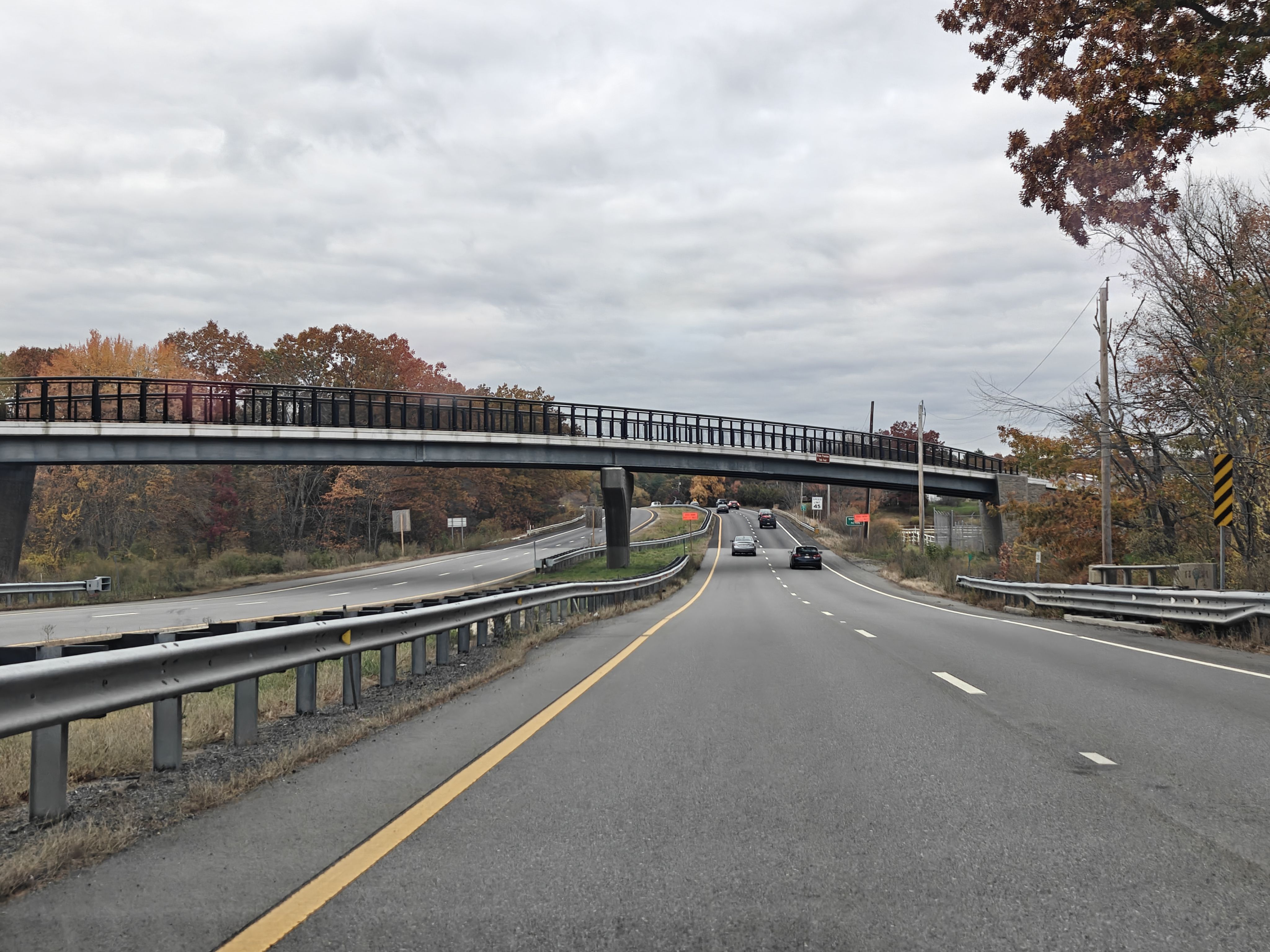 a bridge spanning a road